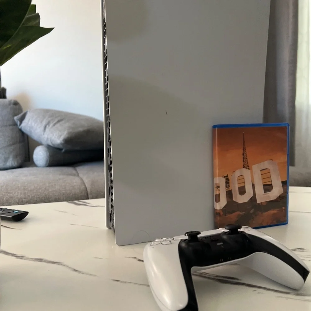 PlayStation 5 with controller and GTA 5